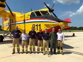 Gruppenbild der Delegation mit Piloten